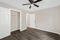 This 12' x 10' third bedroom faces the backyard and also features a ceiling fan.