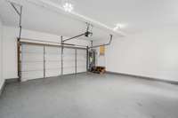 Two-car rear-attached garage with a beautiful epoxy floor