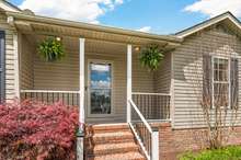 A perfect covered porch for sipping sweet tea!