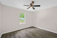 This 12' x 10' third bedroom faces the backyard and also features a ceiling fan.