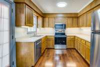 View into the Kitchen with ALL NEW APPLIANCES THAT ARE INCLUDED