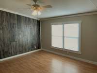 Master bedroom accent wall, double windows, ceiling fan, walk-in closet, and of course, master bath.