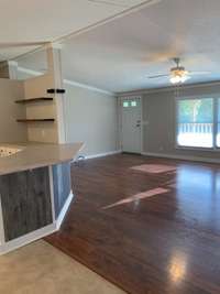 Great open concept with a bar in between the kitchen and dining area.