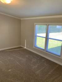 One of the secondary bedrooms, 3 windows, a double door closet, and the carpet is like new!!!!