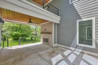 Covered patio on the main floor with a gas fireplace. A great space for entertaining.