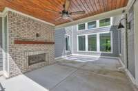 Covered patio on the main floor with a gas fireplace. A great space for entertaining.