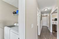 Convenient laundry area tucked away from main living area