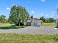 This property 3 beautiful trees at the rear and a large gravel driveway! 1138 Weeks Rd  Murfreesboro, TN 37127