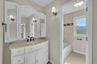 The second full bathroom boasts a single vanity with a trifold mirror.1138 Weeks Rd  Murfreesboro, TN 37127