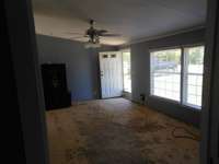 Family room carpets was removed to be replaced by buyers