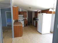 Kitchen with all appliances to remain