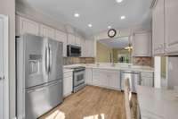 The open space between the Kitchen and Living area is great for entertaining.