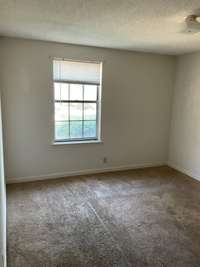 Downstairs bedroom features a large closet.