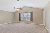 Oversized bonus room upstairs with vaulted ceiling and walk-in storage room.