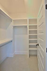 One of the closets in the upstairs bedroom.  No wire shelves in any of the closets in this house!