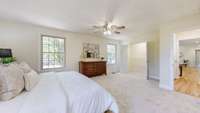 Largest of the 2 primary bedrooms with 2 walk-in closets and full bath.