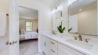 Double vanities in primary bath.