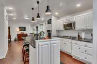 Kitchen and dining room also features skylights for added natural light.