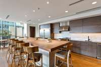 Full kitchen in the Owner's lounge to wine and dine with guests.