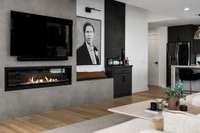 Enjoy the custom porcelain tile electric fireplace - perfect for entertaining on a night in.