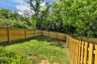 Spacious deep fenced backyard