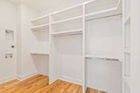 Main Level Primary Closet with stackable laundry hook ups