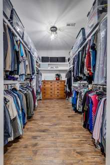 Massive Master Closet with abundance of shelving