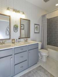 Hall Bath with Optional Double Vanities. Photo is of a similar floor plan, not actual home.
