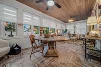 SunRoom features Herringbone tile floors with bead board ceiling.