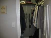 Walk in closet in master bedroom.