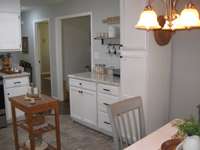 Right side of kitchen with newly installed additional cabinets.