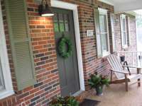 Enjoy relaxing on this wonderful front porch.