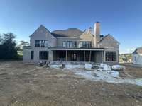 Rear Elevation from private backyard. *this home is under construction Photo taken 9/5/24