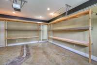 2 car attached garage with shelving