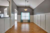 Formal dining area opens to great room