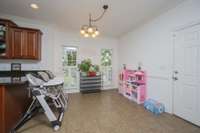 Roomy nook for family dining. Door to garage means bringing your groceries right into the kitchen.