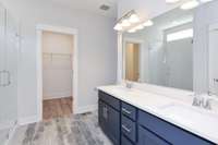 Double vanities in owner's suite *Photo not of actual home