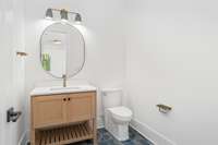 This powder room is located in the lower level recration area.