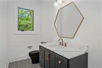 Guest powder room on the main level.