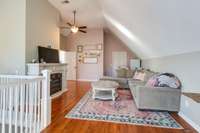 GUEST HOUSE UPPER LEVEL LIVING ROOM WITH FIREPLACE