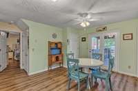 Nice eat-in area of kitchen with glass doors leading onto the covered back deck