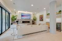 Custom fireplace lighting, wet bar, and more