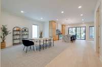 Airy 10' ceilings, recessed lighting, wide plank white oak floors throughout