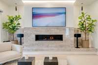 Gorgeous modern fireplace with custom stone surround