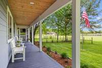 As you round the corner from front door, you see one of two exterior entries to the screened porch.