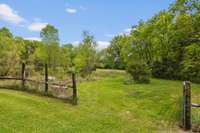 This is the gated access to the back, mostly wooded acreage and two seasonal ponds and creek.
