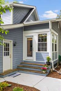 This shows you the exterior access to the mudroom/laundry and primary sitting room.