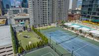 Look at the amazing dog park. A build-in sprinkler system keeps it cleaned daily.