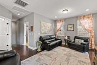 Upstairs Bonus Room / Man Cave / extra family room, again hardwood through out ~ surround sound speakers built into the walls.