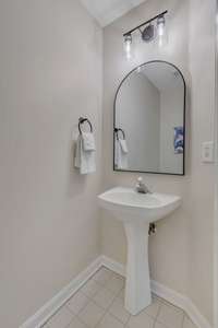 Powder room off kitchen/living room.